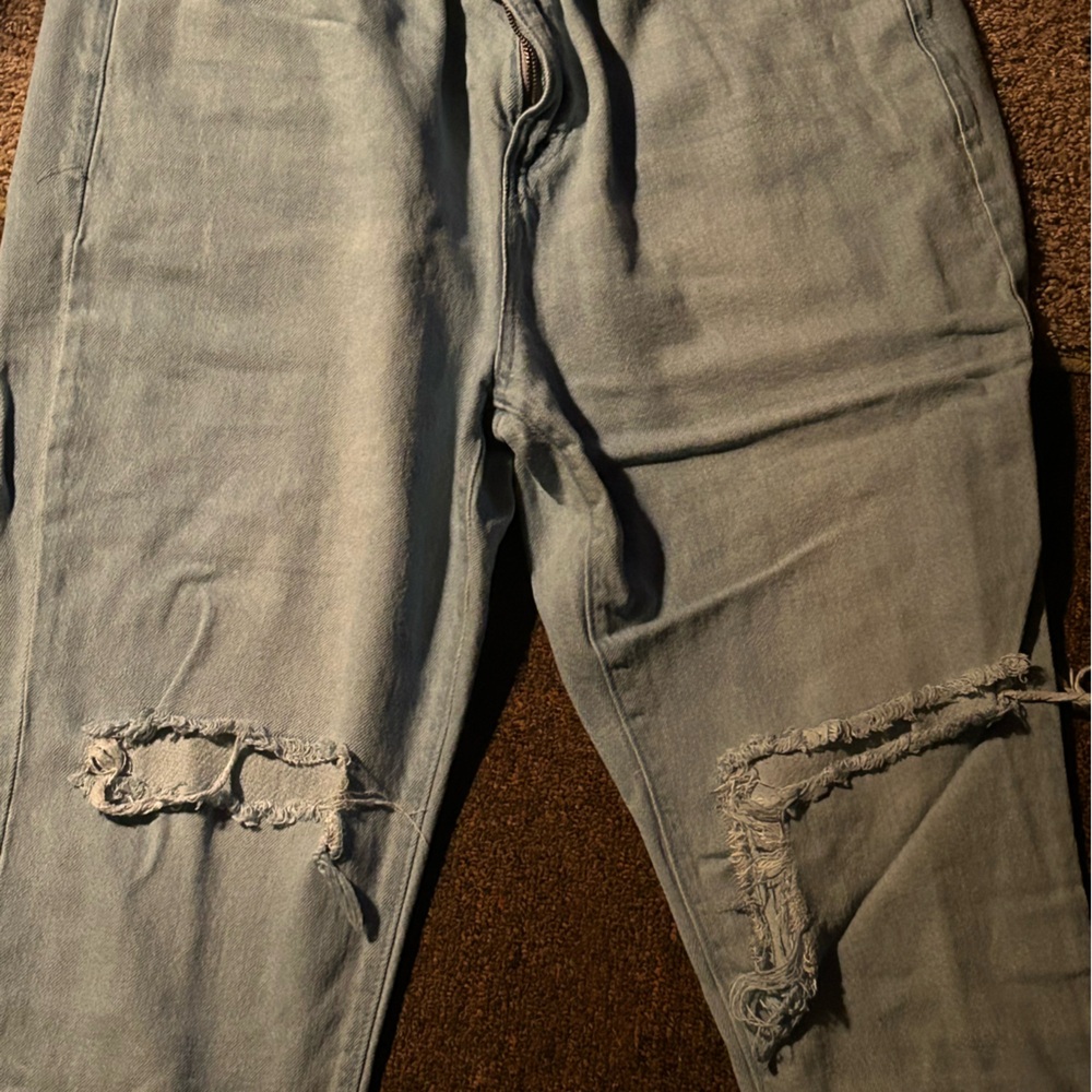 Distressed Light Blue Jeans